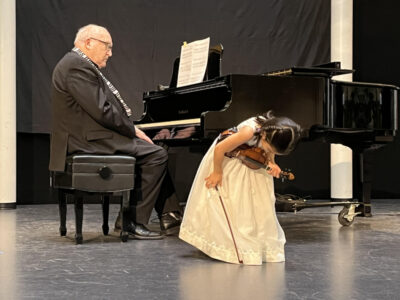 Grand opening! Five year old Georgina Vrana and her accompanist, Tom Brighouse, perform the opening number at the Shuswap Music Festival Gala, April 29 at Nexus.